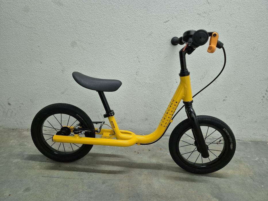 Bicicleta de aprendizagem criança amarelo BTWIN