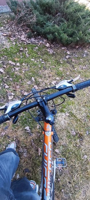 Rower srebrno-pomarańczowy  KTM