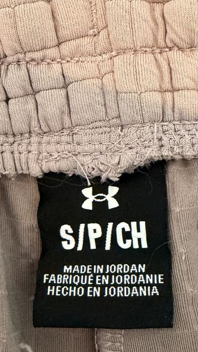 Under Armour Жіночі пудрові спортивні штани Unstoppable Flc Grid Crop