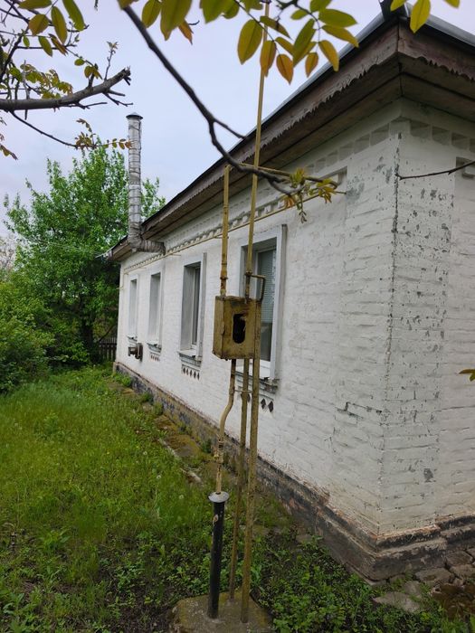 Продам приватизовоний будинок з приватизованою землею 45 соток.