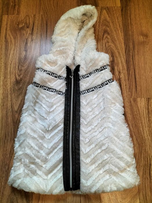 Bezrękawnik dziewczęcy 122/128