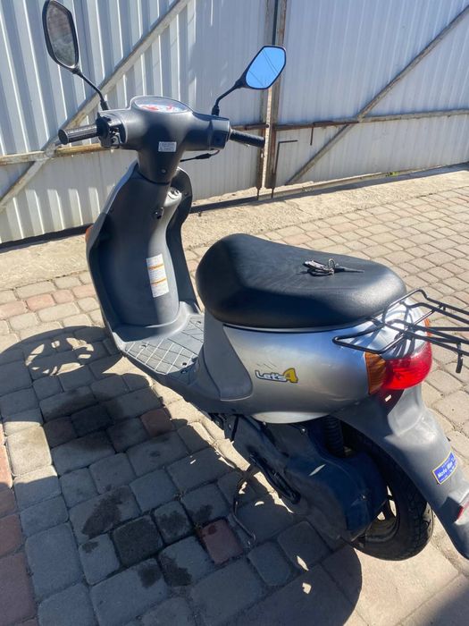 Мопед Suzuki lets 4