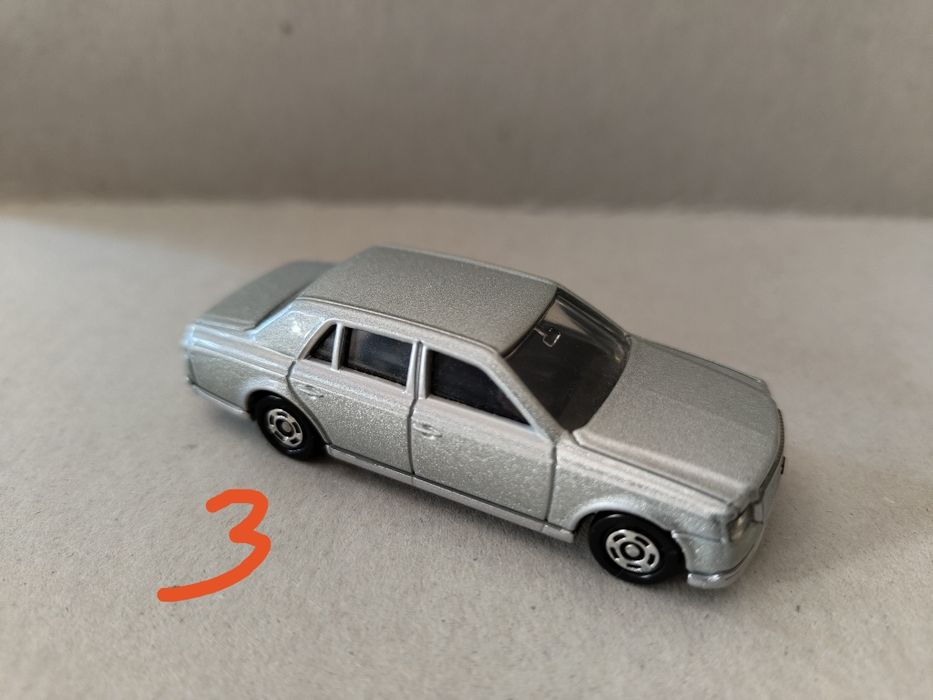 Carros tomica com caixa