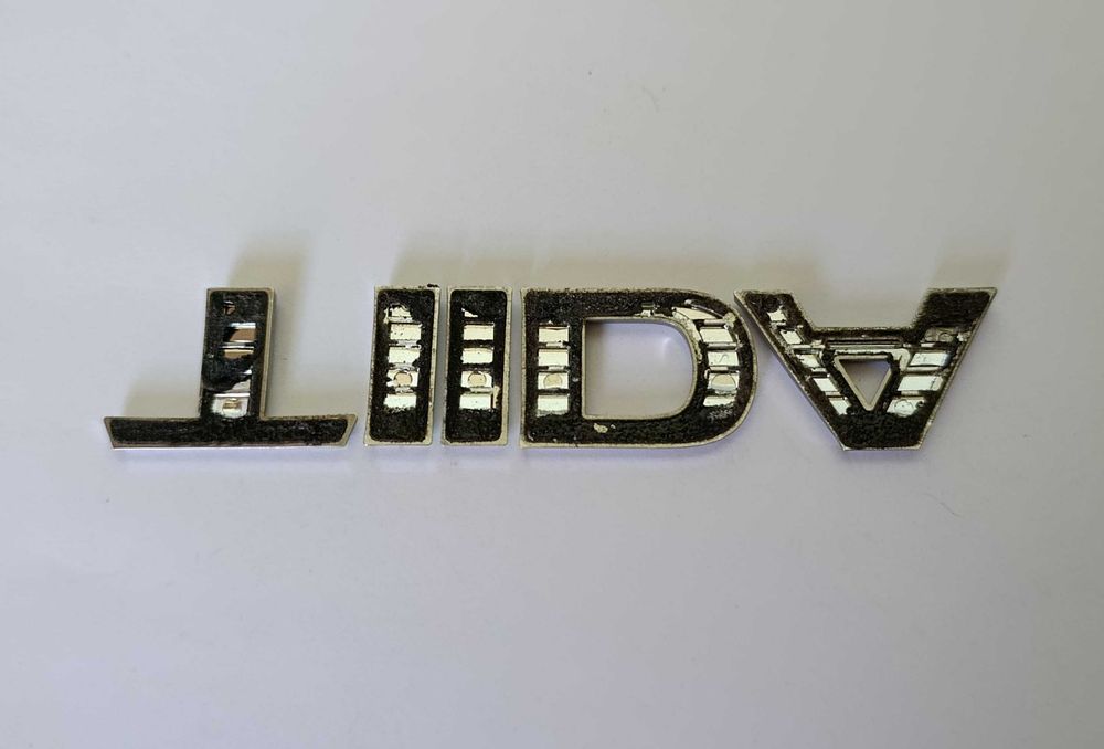 Napis emblemat Nissan Tiida I 04-12r