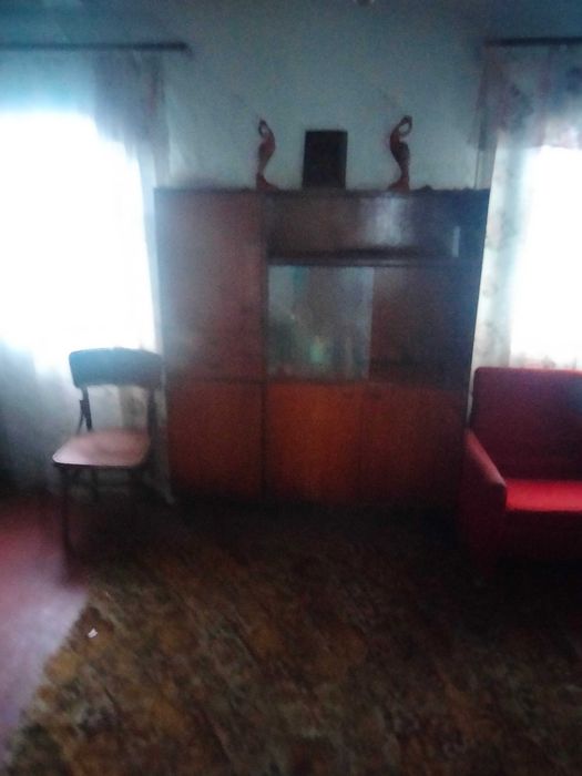 Земельна ділянка з будинком та прибудовами