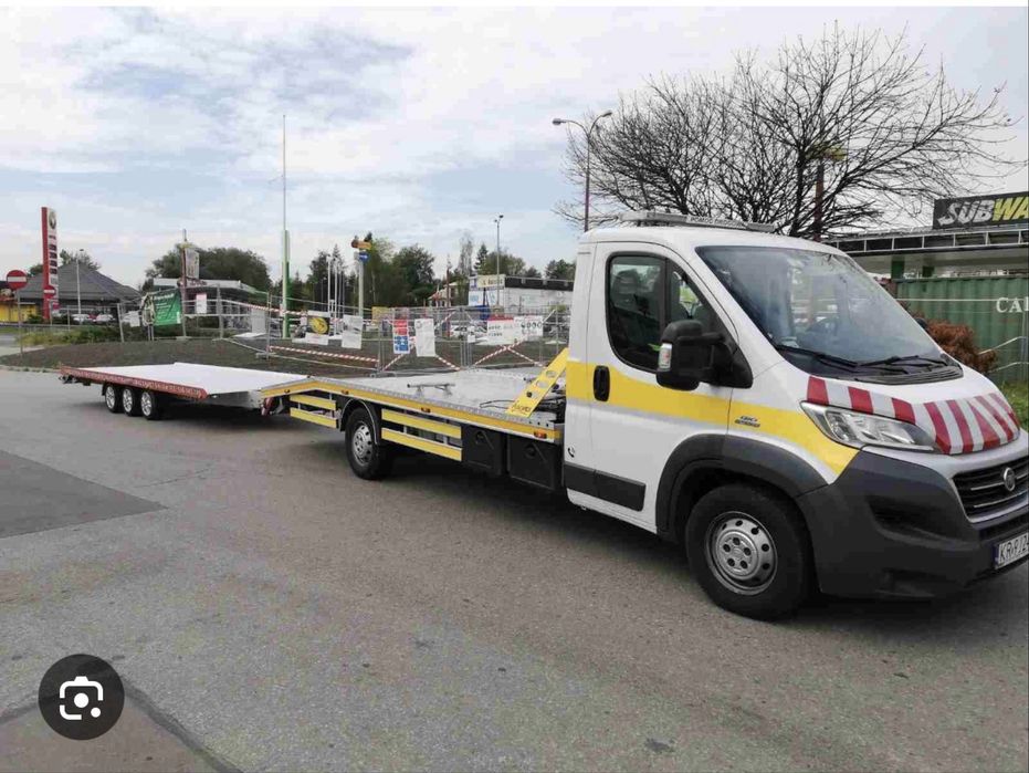 Autolaweta autopomoc holowanie transport