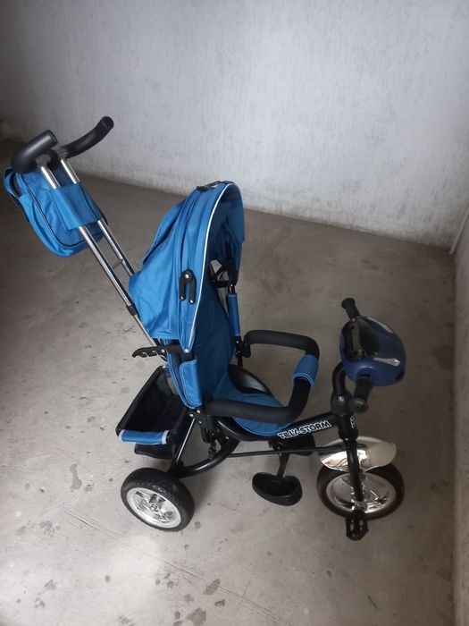 Трёхколёсный велосипед-коляска с родительской ручкой Tilly Storm.