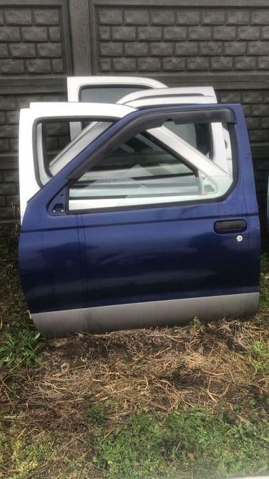 navara d22 drzwi lewy przód lewe przednie