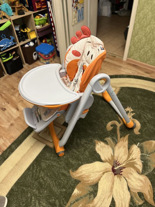 Продам дитячий  стільчик для  годування , фірми Chicco polly 25 star