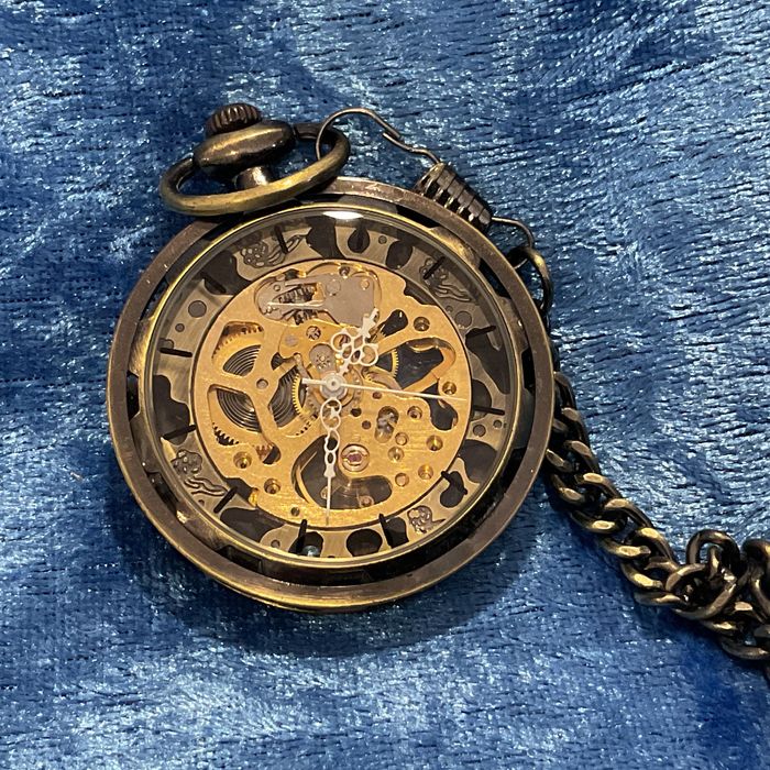 Relógio de bolso manual a trabalhar 44 m corrente ,ver anúncios abaixo