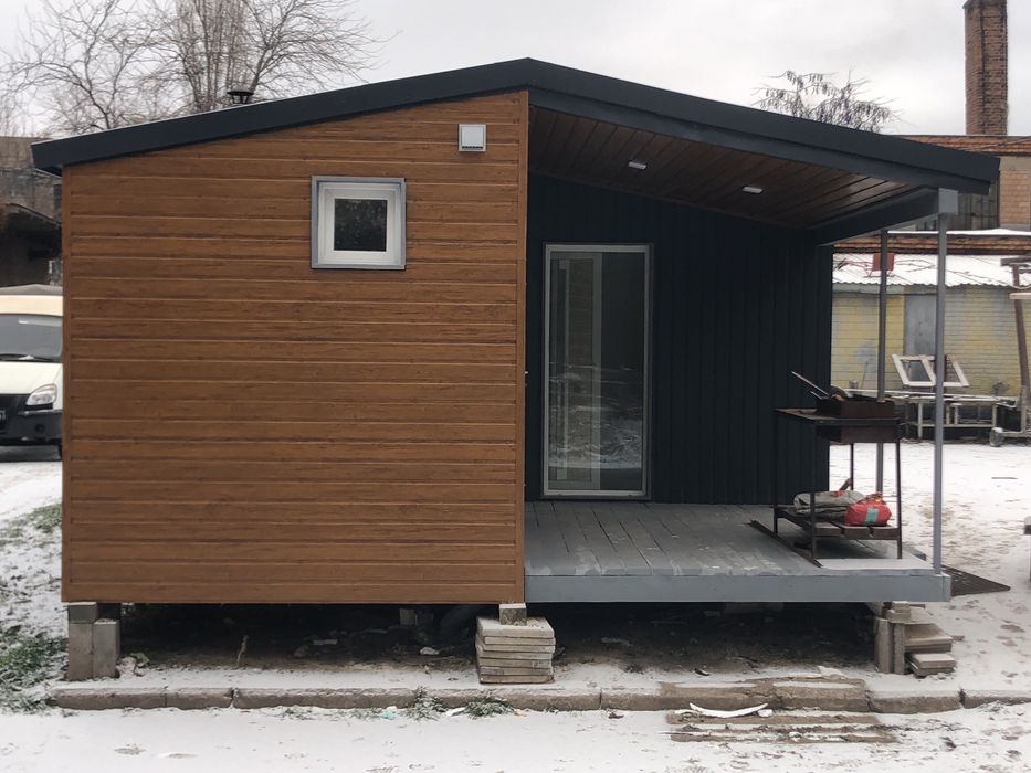 Модульний будинок з каміном.