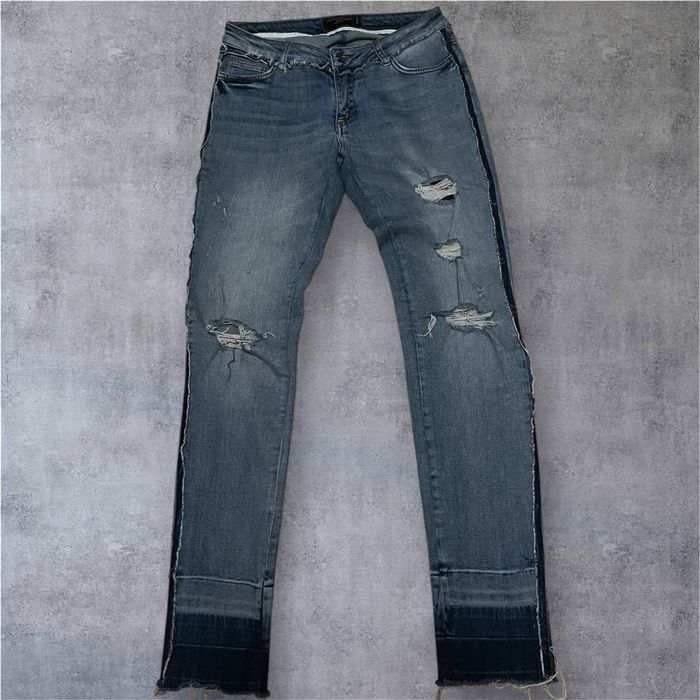 Штани від бренду Doce&Gabana