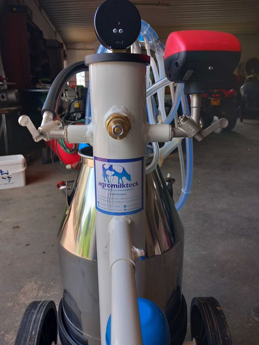 Máquina de ordenhar dupla