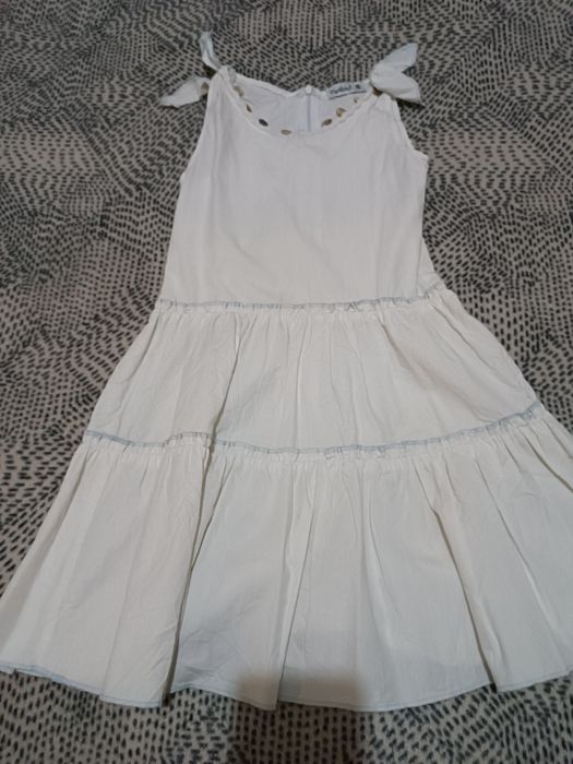 Roupa de criança e senhora