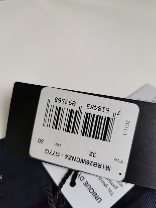 Nowe oryginalne spodnie męskie eleganckie Guess 32 granatowe