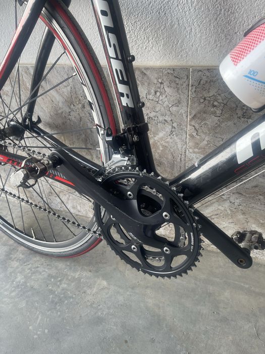 Bicicleta de ciclismo Moser 111 em carbono.