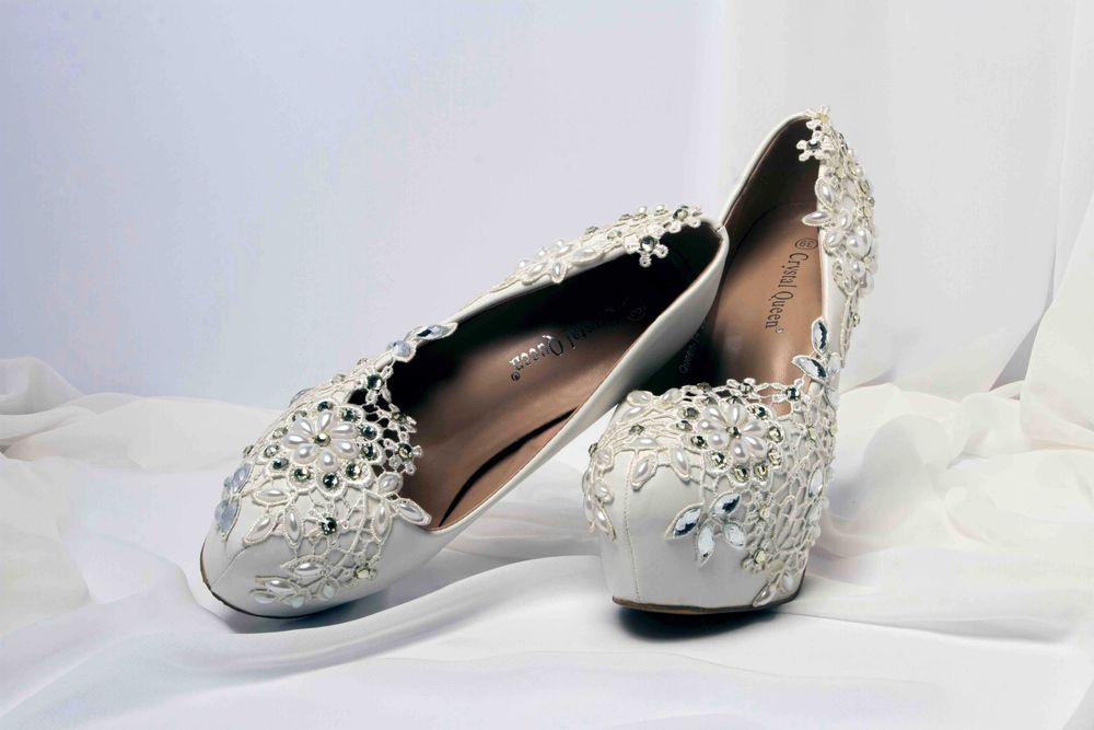 Весільні білі туфлі