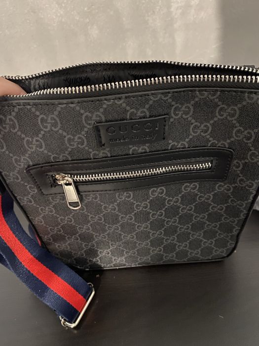 Bolsa gucci.