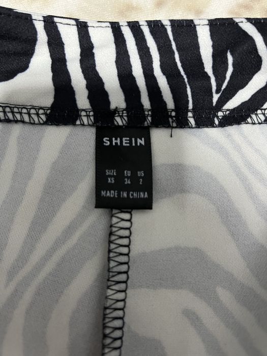 Штани Зебра, Шейн