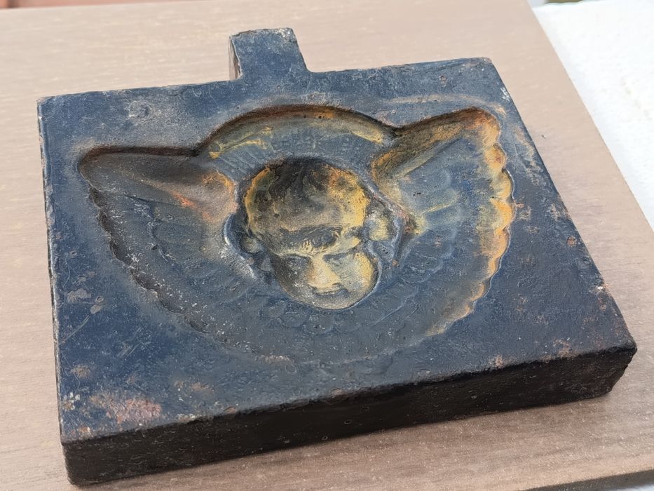 Molde de anjo em ferro fundido