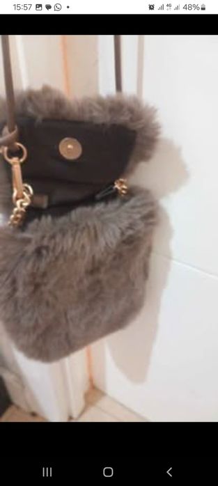 Bolsa de peluche tifossi nunca usado nova muito fofinha