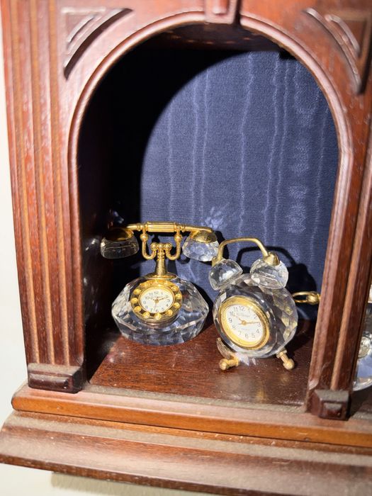 Colecao de relogios em cristal e ouro