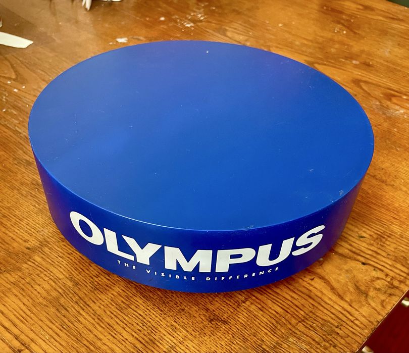 Обертаючий стенд Olympus