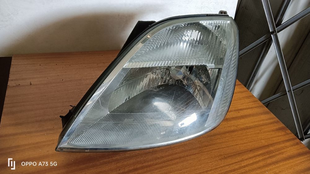 Farol Ford fiesta 5 ótica 2004 esquerda original