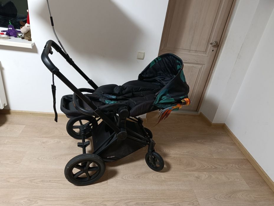 дитяча коляска Cybex Priam з колекції Birds of Paradise.