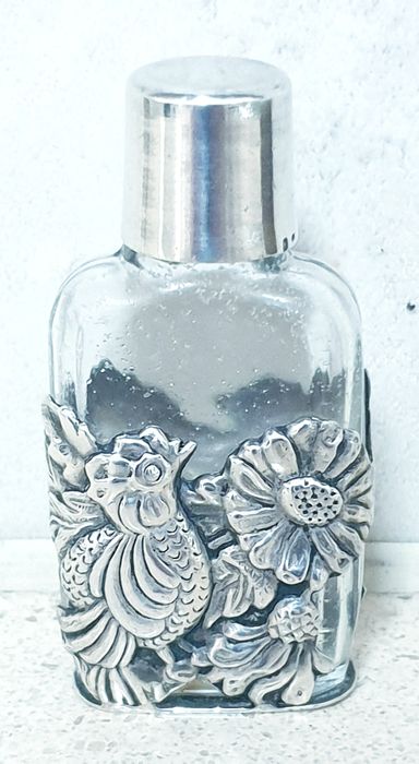 Beautiful small perfume bottle in contrasting Portuguese silver
