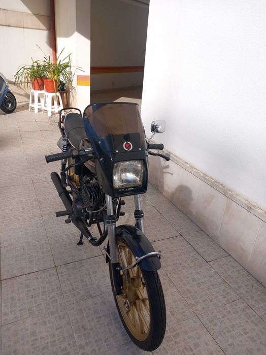 motorizada casal fumdador k603