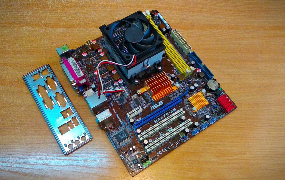 Материнська плата sAM3 Asus M4A78-AM + процесор + охолодження