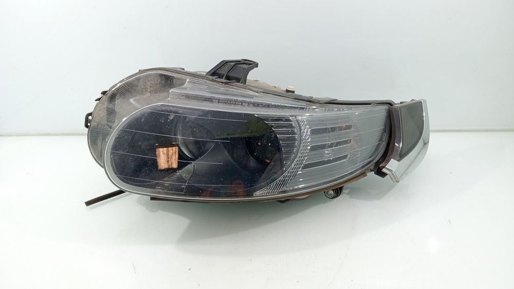 farol esquerdo saab 9-5