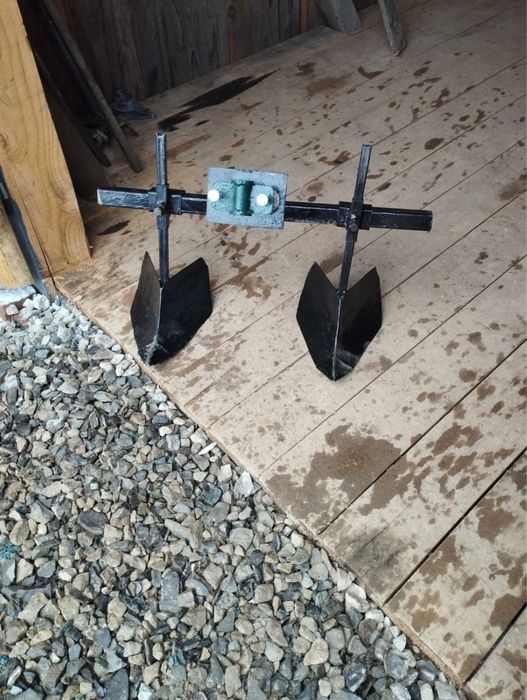 Плуги (марка) до мотоблока