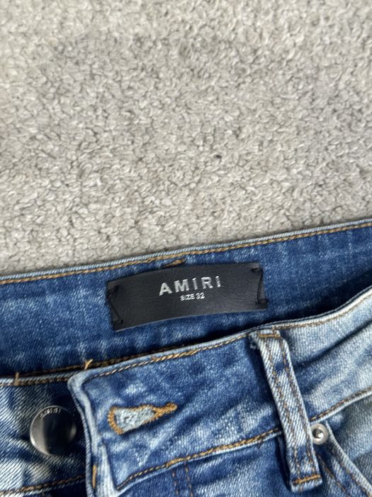 Spodnie amiri jasno niebieskie 32