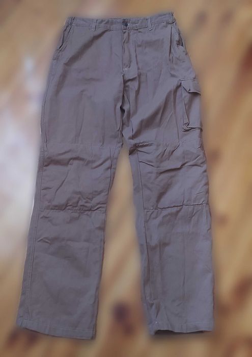 Коричневі брюки штани