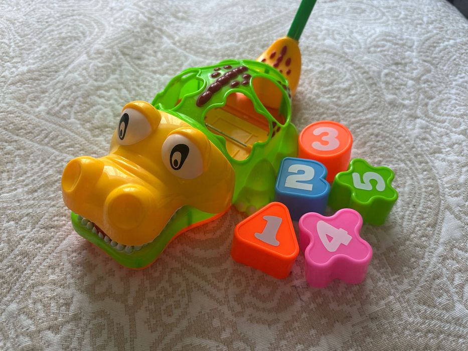 Іграшка-каталка Крокодил