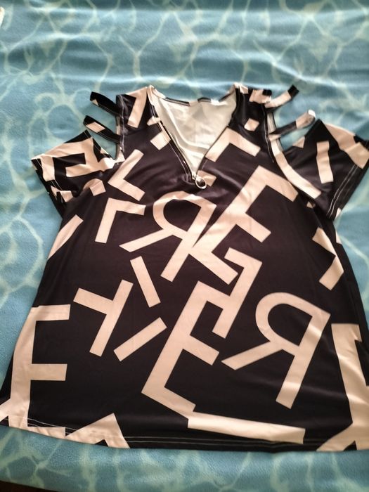 Camisola decote em V tamanho L. Mangas giras