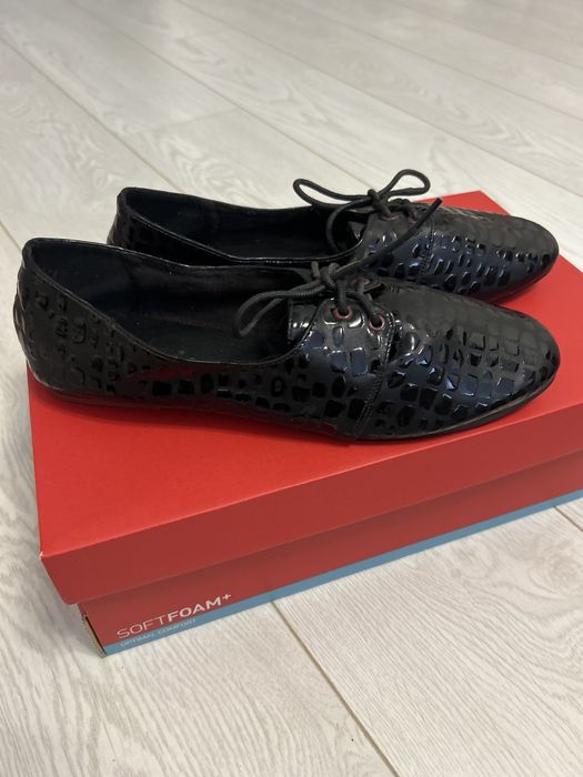 Новые кожаные туфли