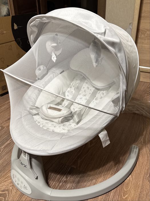 Заколисуючий центр, гойдалка для немовлят