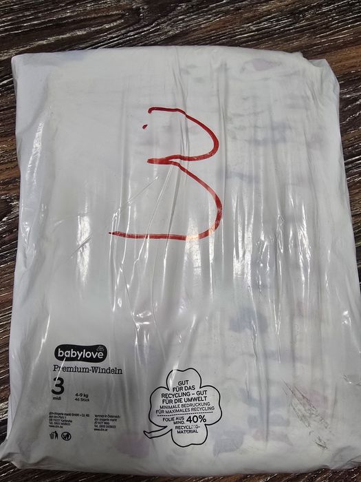 Продам памперсы разные