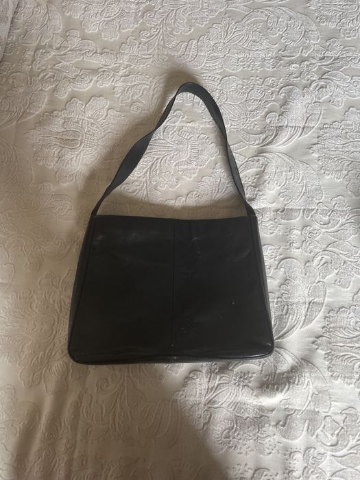 Mala preta com uma alça