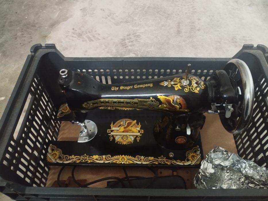 Máquina de costura singer