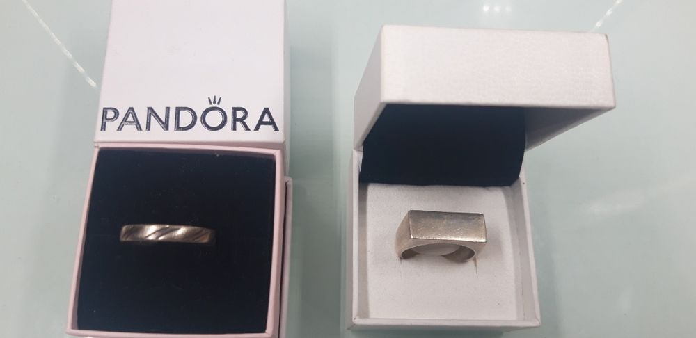 2 aneis de prata 925 ler discrição.