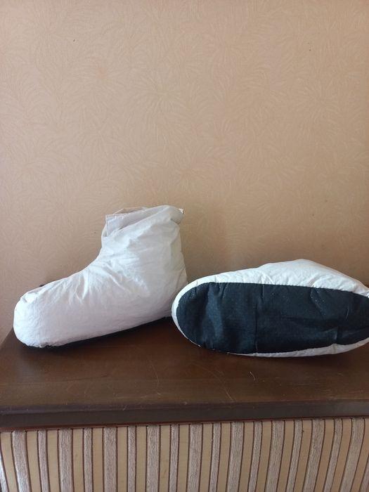 Тапки домашні ,для сну  в середині пр'я та пух7.