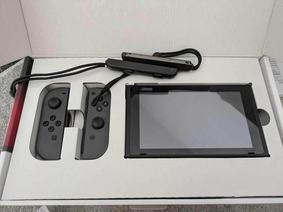 NIntendo Switch 1 c/ dock, comando e jogos