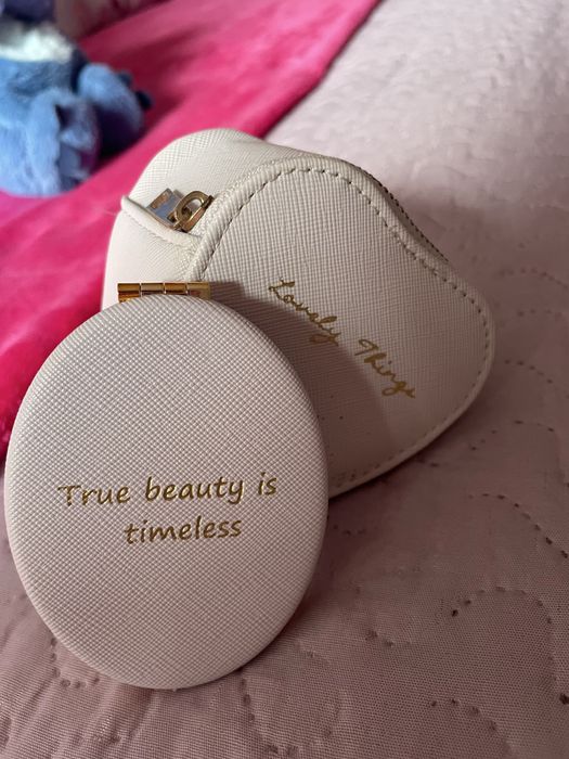 Conjunto de espelho e bolsa