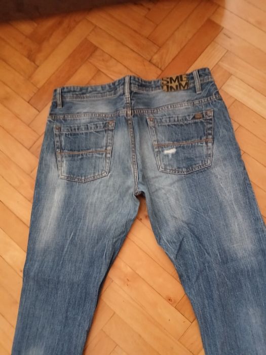 Spodnie jeans męskie z przetarciami  New Yorker  34