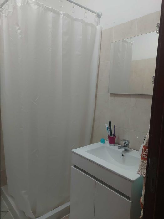 Cortina de duche com argolas e varoes