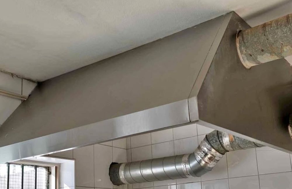 hotte.  em  inox